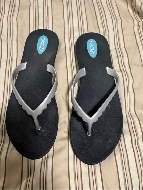 OKA b. Shoes - OKA b. Black Footbed Flip Flops with Silver Scalloped Straps